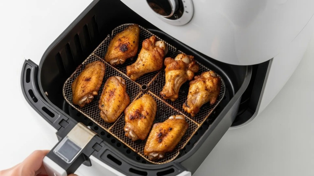 Abertura cesto air fryer — Foto: Reprodução/Redes Sociais