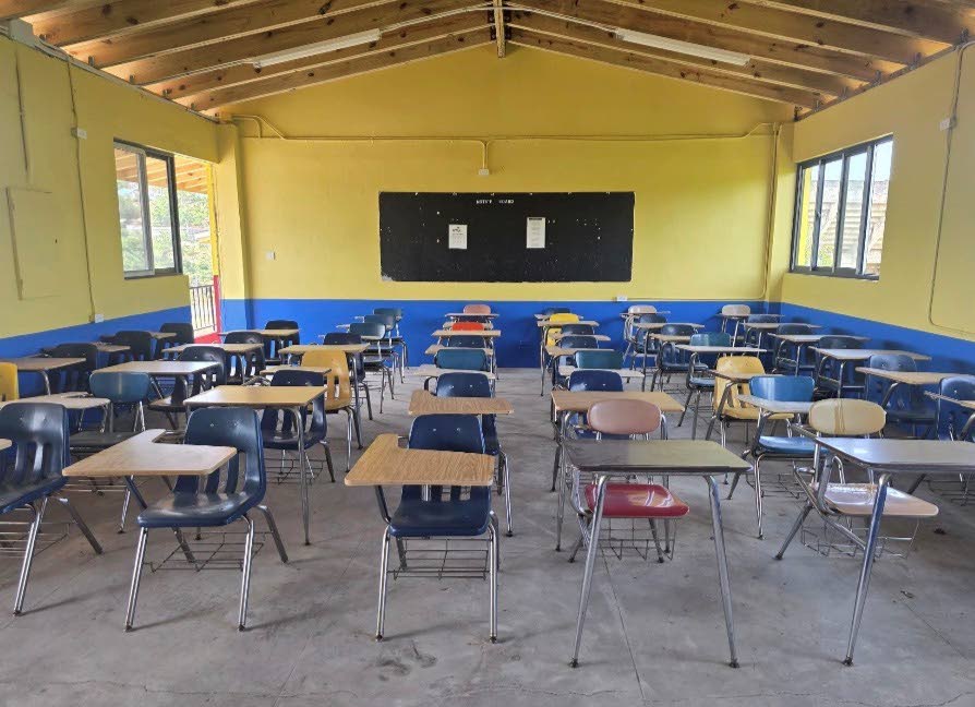 Reclaimed and donated furniture shipped to a western Jamaica school and that are in use in classrooms that were renovated after Hurricane Melissa.