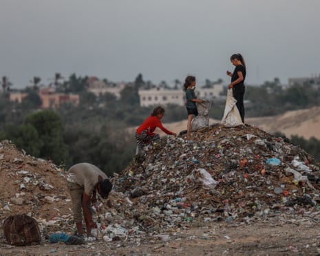 Children in Gaza sift through rubbish for plastic and wood to support their families.