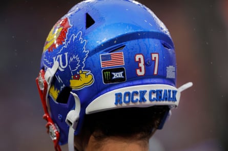 The back of a helmet being worn by Kansas punter Ben Shipley, showing the words of the famous Kansas chant Rock Chalk.