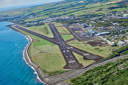 Aerial view of the airport, which is located beside the sea