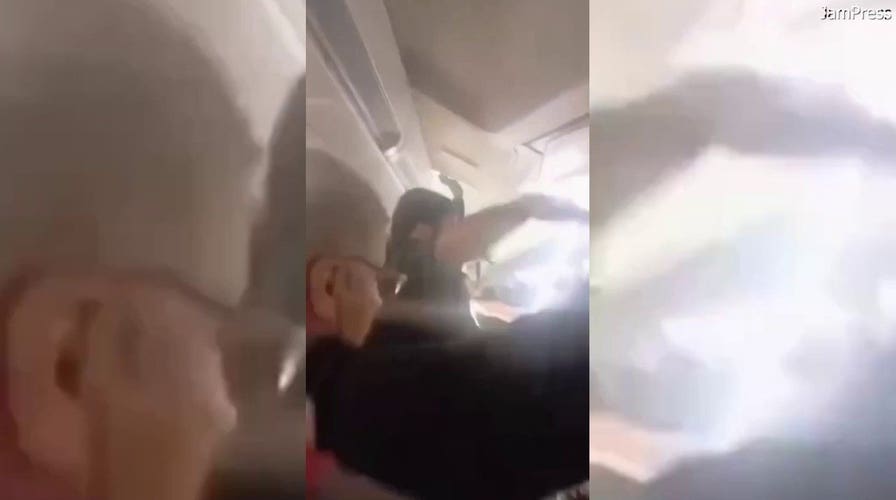 Passengers scream as violent shaking appears to tear apart plane cabin during flight