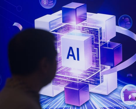 A man walks in front of an AI sign at the Shanghai New Expo Center during the WAIC conference in Shanghai, China.