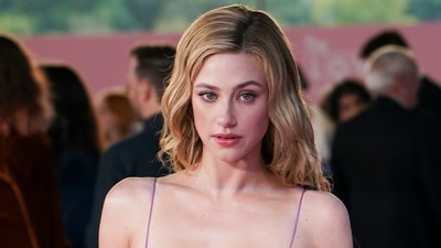 Lili Reinhart poses for photographers upon arrival at "The Love Hypothesis" premiere in London on Wednesday, Sept. 9, 2026. (Photo by Alberto Pezzali/Invision/AP) (AP Photo/Alberto Pezzali)