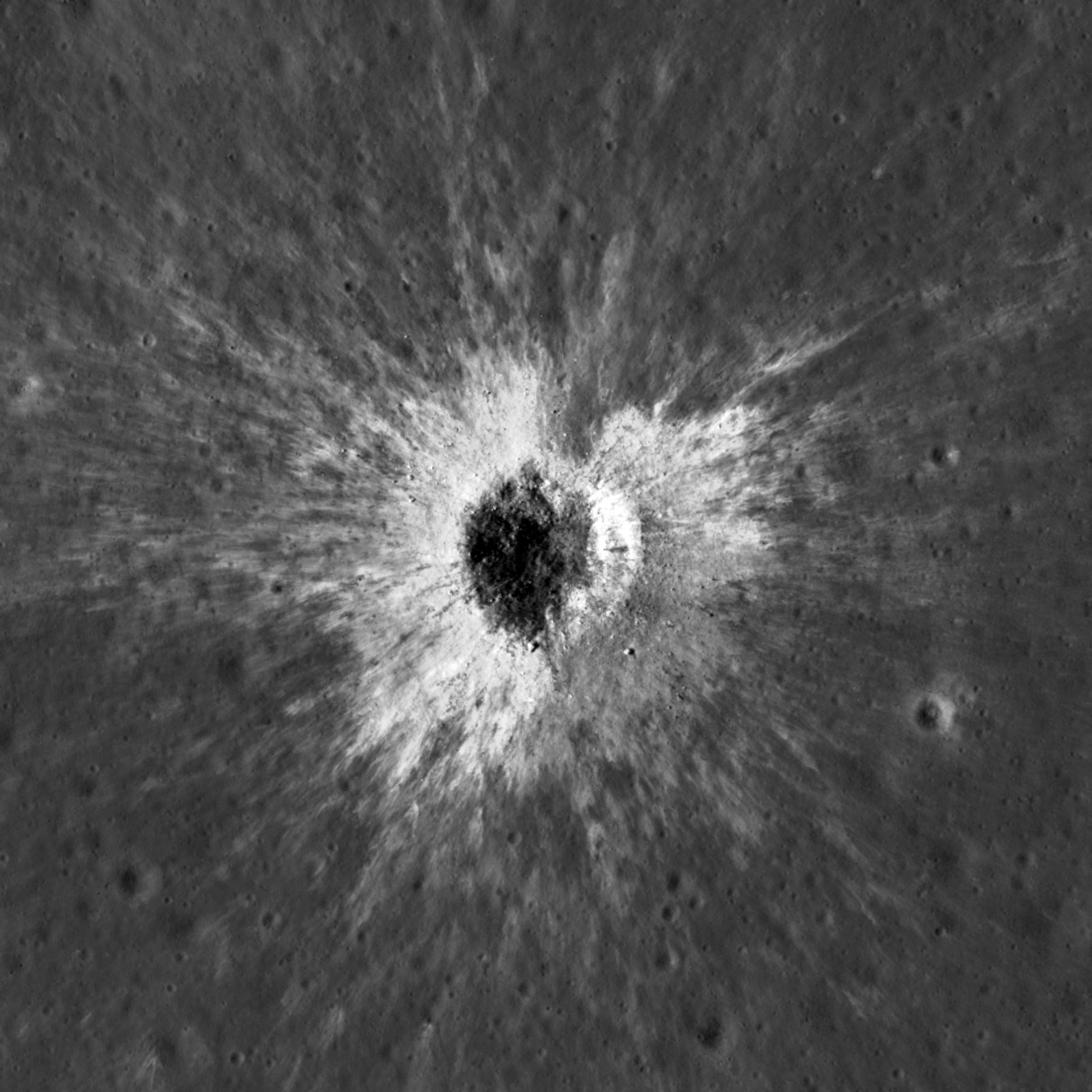 This handout picture published on September 16, 2026 by NASA, shows a new crater on the Moon's surface, taken by the Lunar Reconnaissance Orbiter Camera.