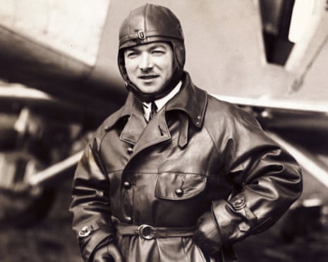 René Fonck in a leather flight helmet and jacket near an aircraft