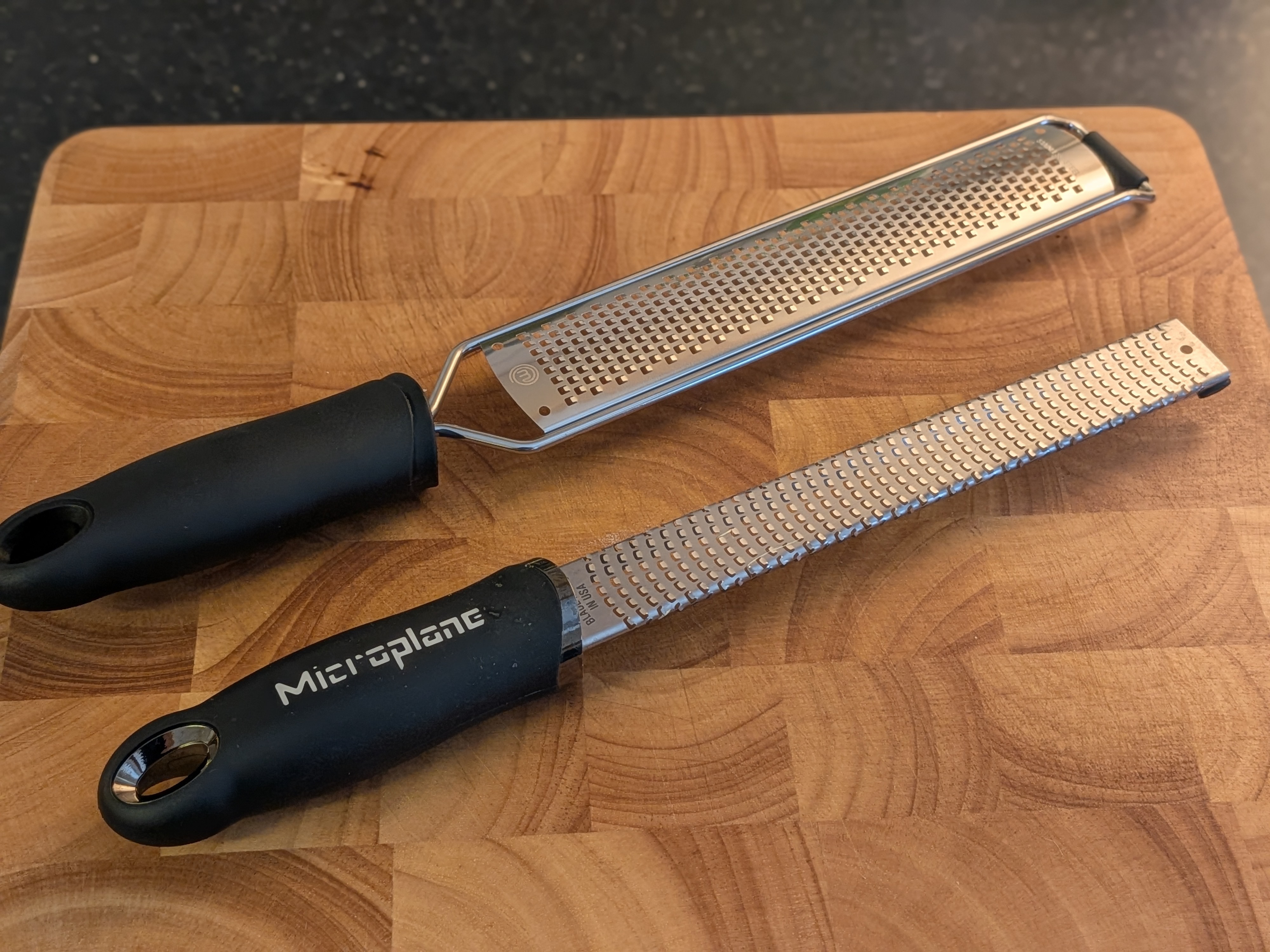 two different microplanes resting on cutting board