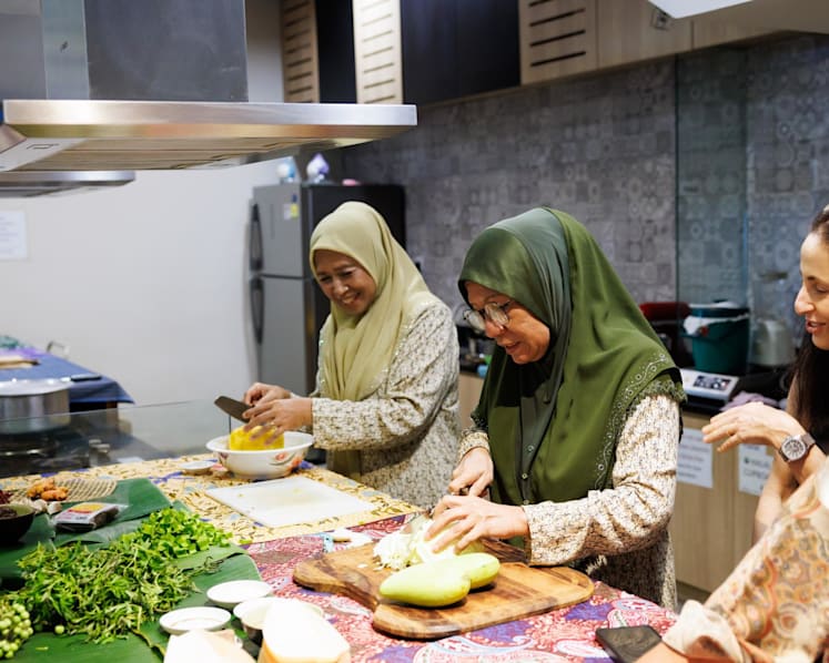 The dishes will be cooked by Orang Laut SG founder Firdaus Sani's mother, Noorani Rani (left), with aunt Rohaini helping to run the floor. (Photo: Orang Laut SG)