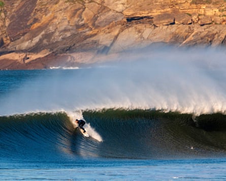 A surfer on a wave at Croyde.